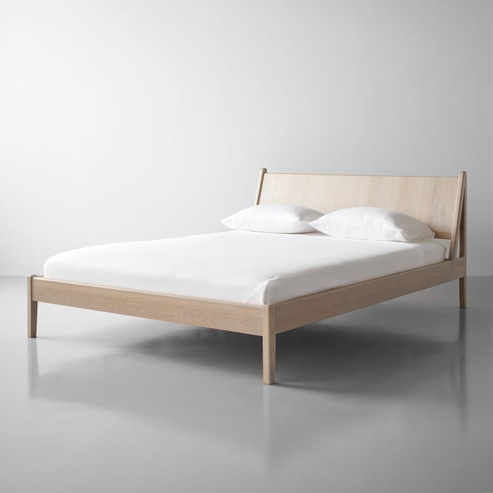 Platform Bed featuring Angled Headboard Sun at Six Plume Design