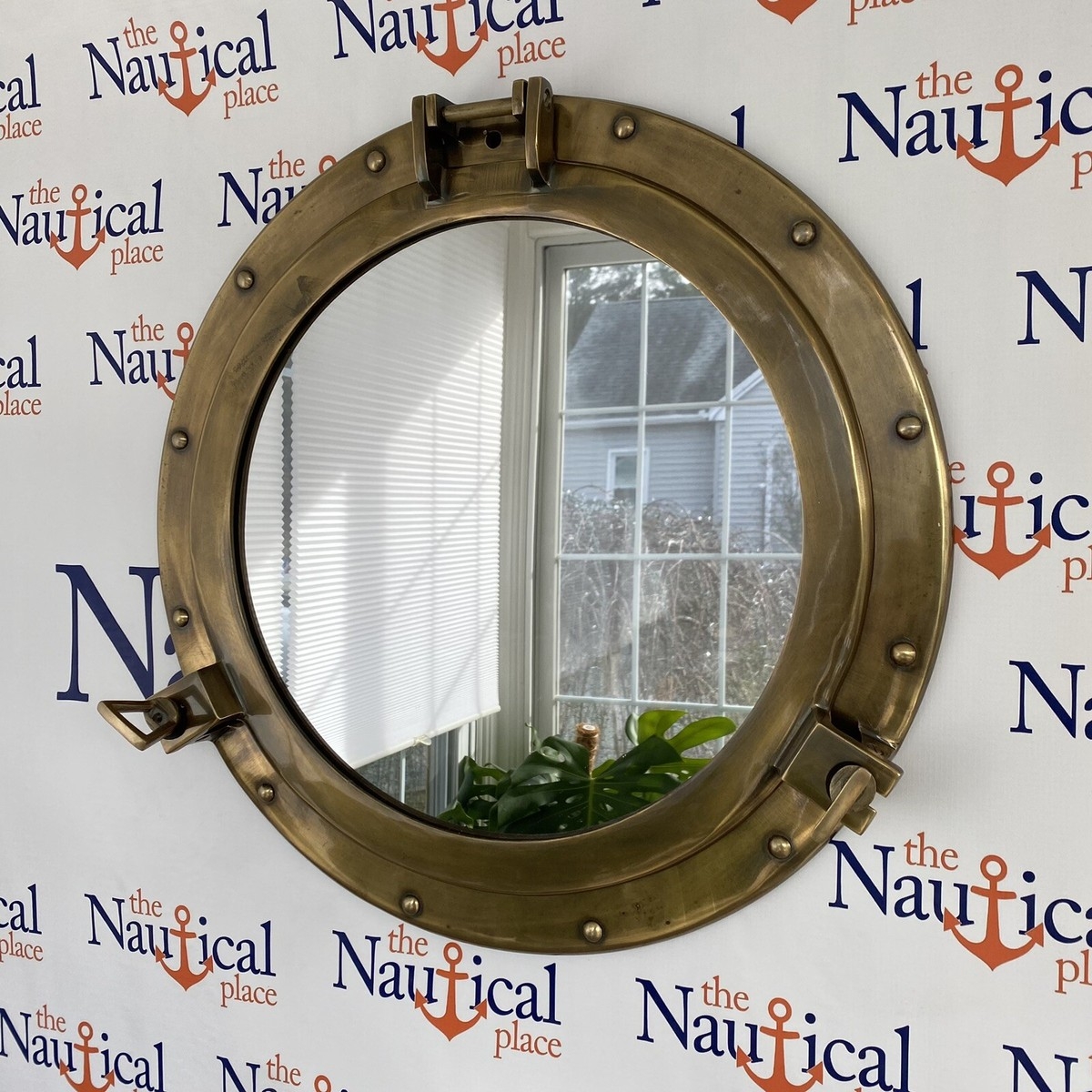 Porthole Mirror with Antique Brass Finish and Side Latches