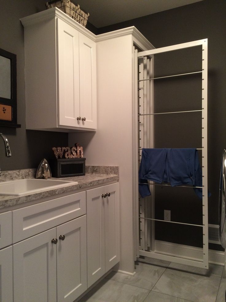 Pull-Out Drying Rack utilizes Vertical Slide and Hidden Unit
