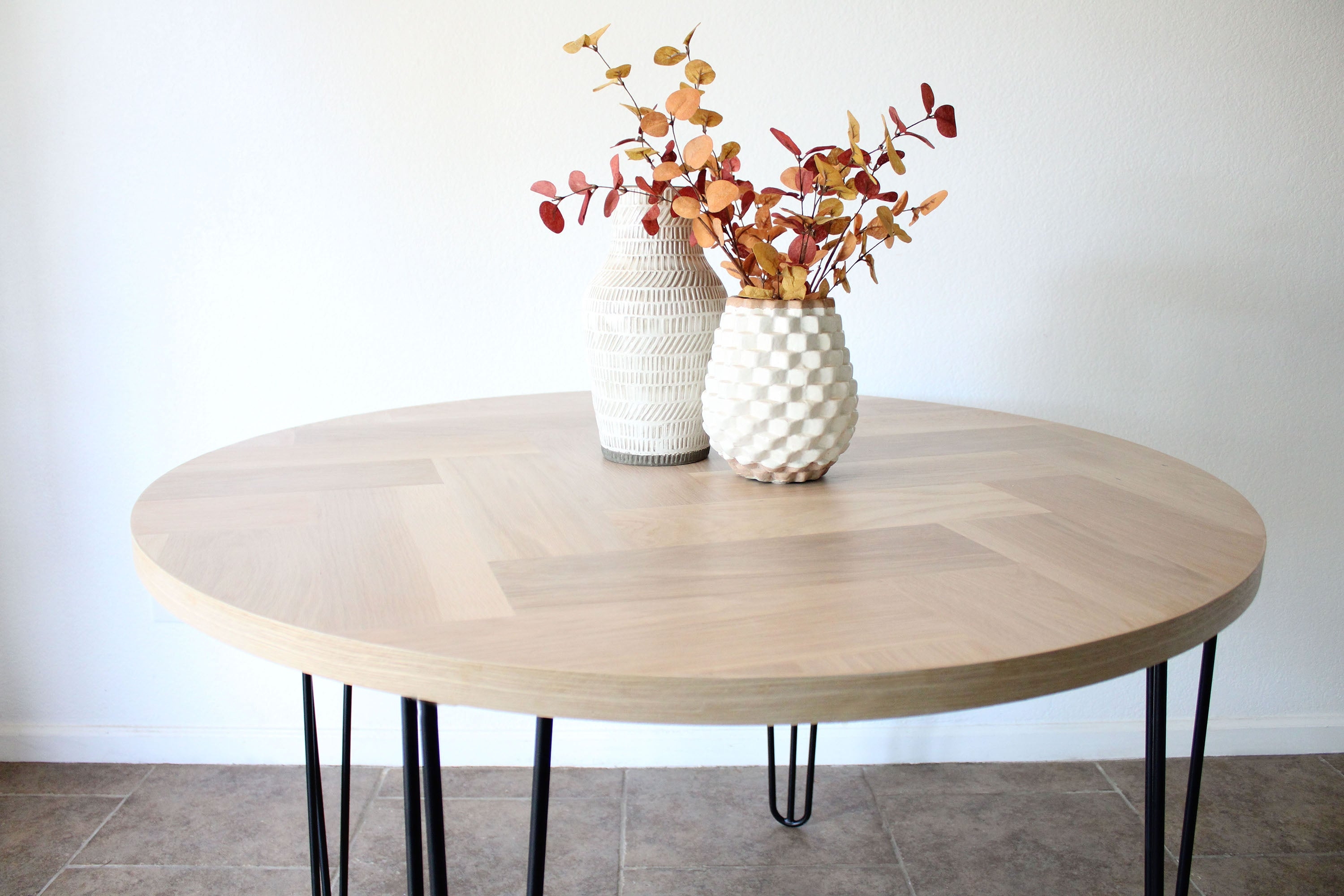 Round Dining Table: Herringbone pattern and hairpin legs