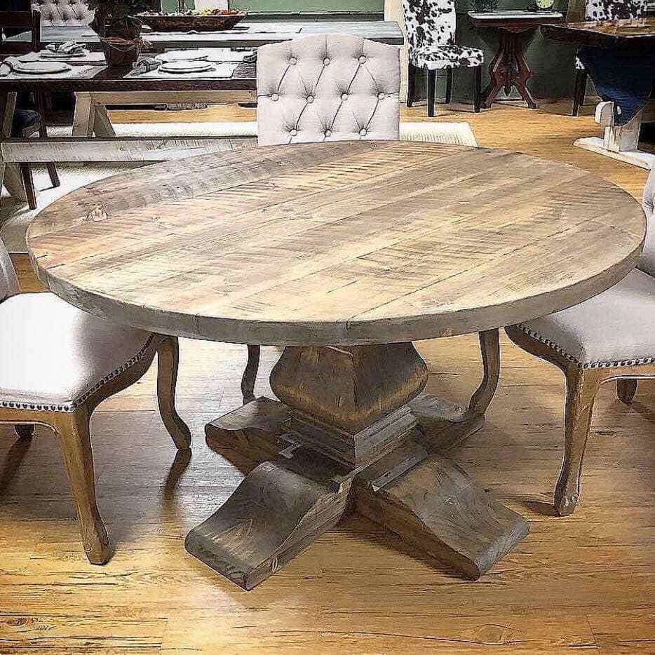 Round Dining Table showing Curved Feet and Plank Surface