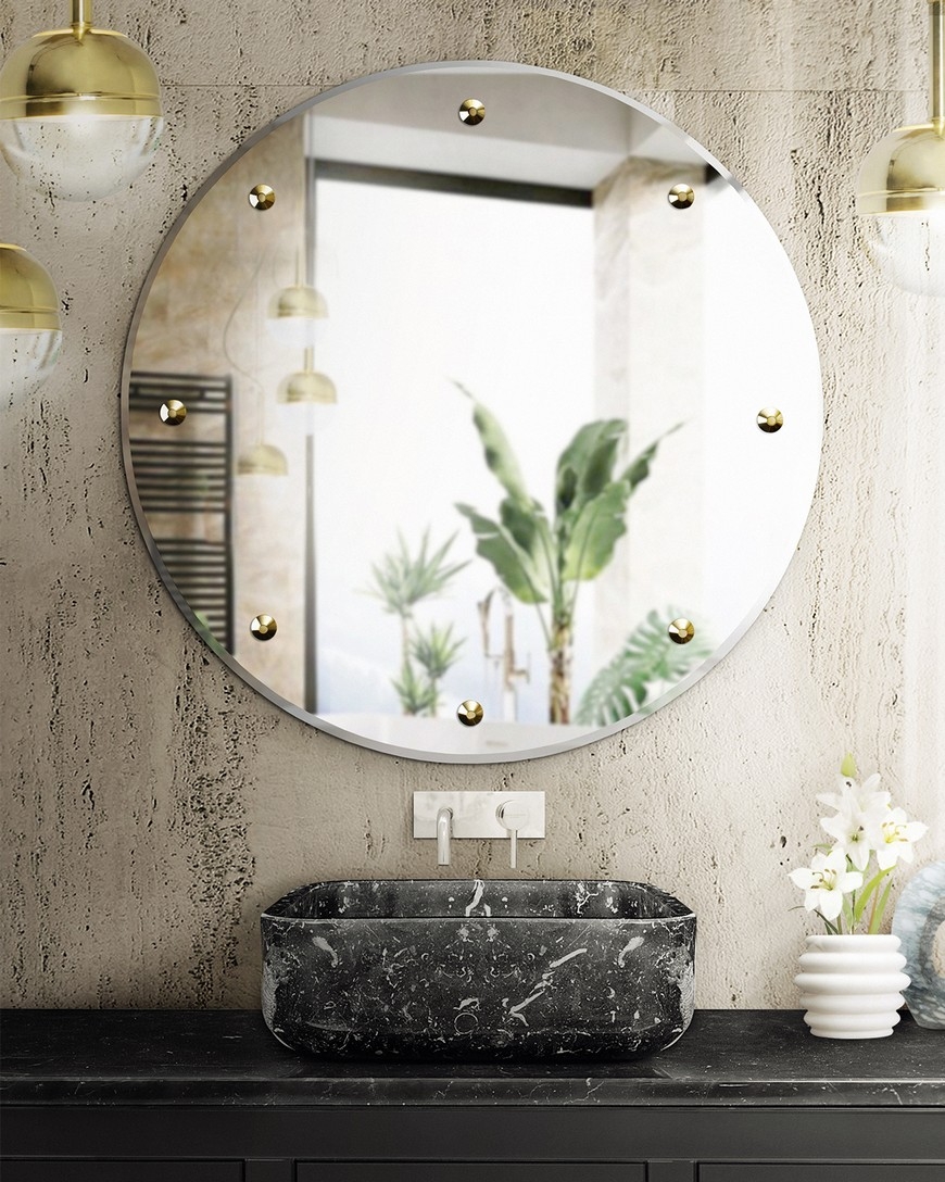 Round Mirror with Gold Studs Textured Plaster Wall Look