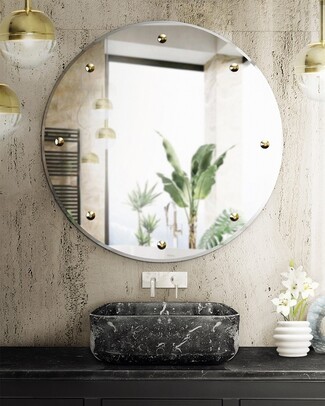 Round Mirror with Gold Studs Textured Plaster Wall Look