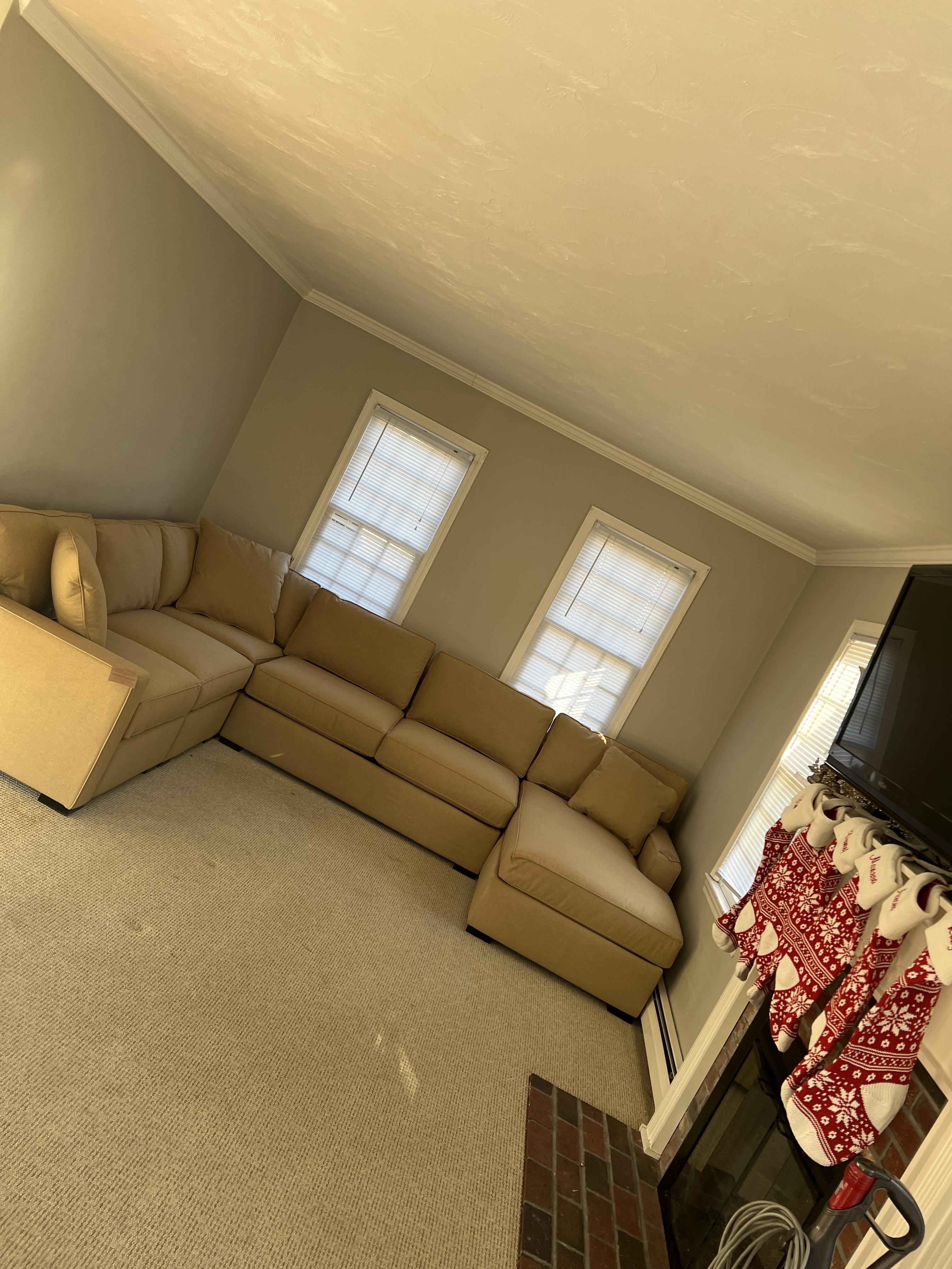 Sectional Sofa featuring a Chaise Lounge and Neutral Palette