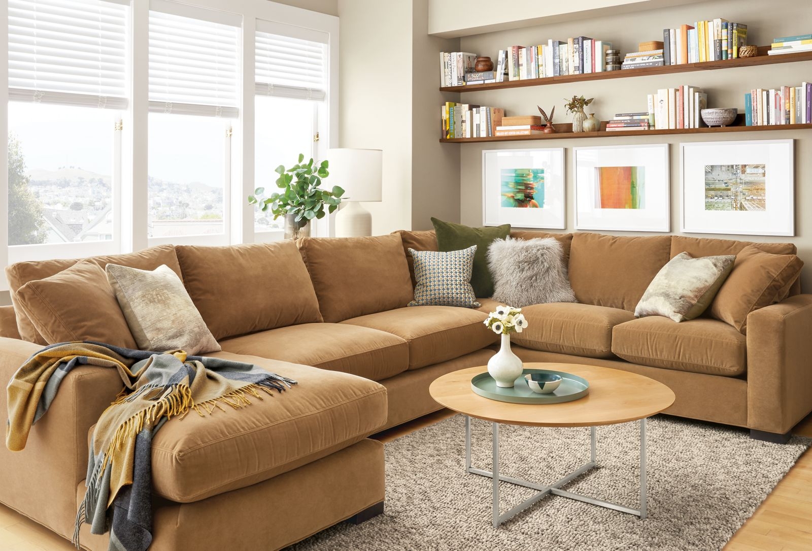 Sectional Sofa featuring Floating Book Shelves and X-Base