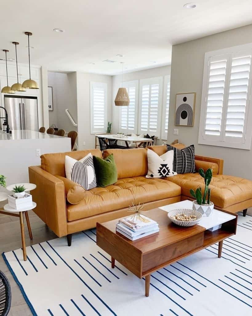 Sectional Sofa featuring Tufted Seat and Camel Tan Leather