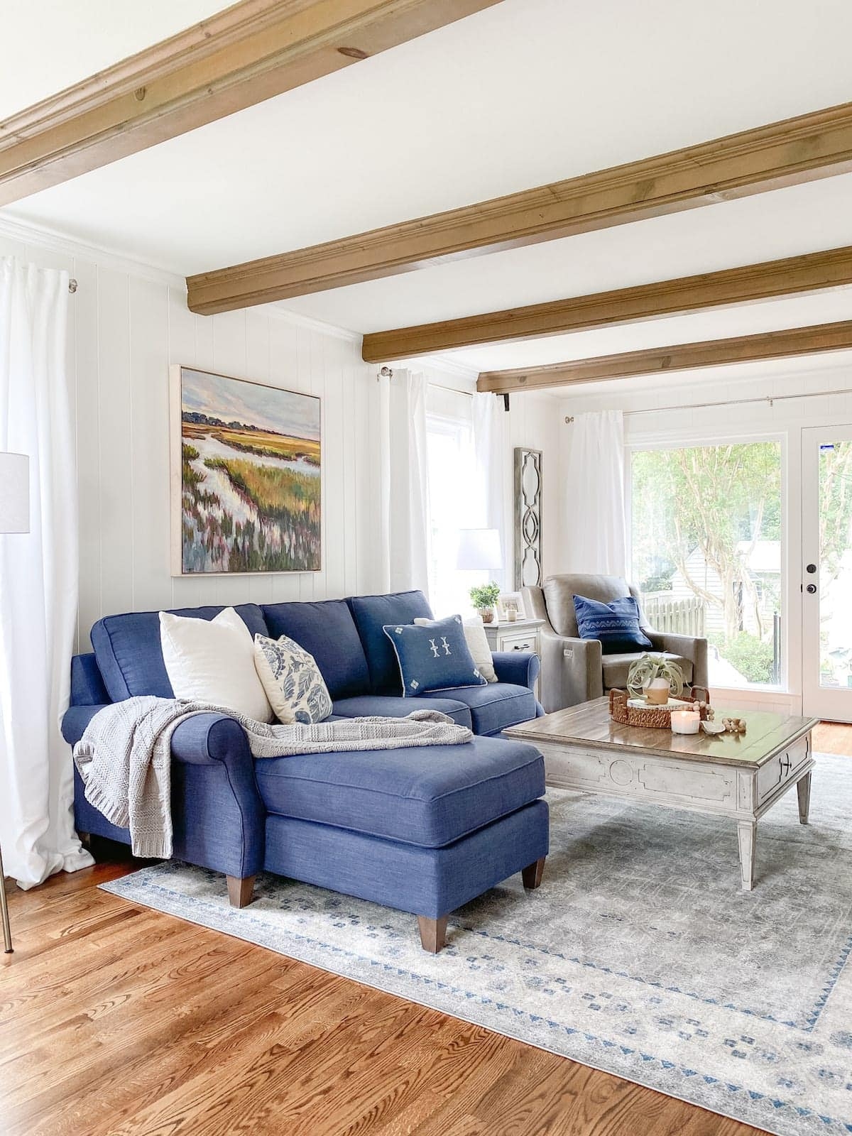 Sectional Sofa Navy Blue Upholstery Shiplap Wall With Wood Beams