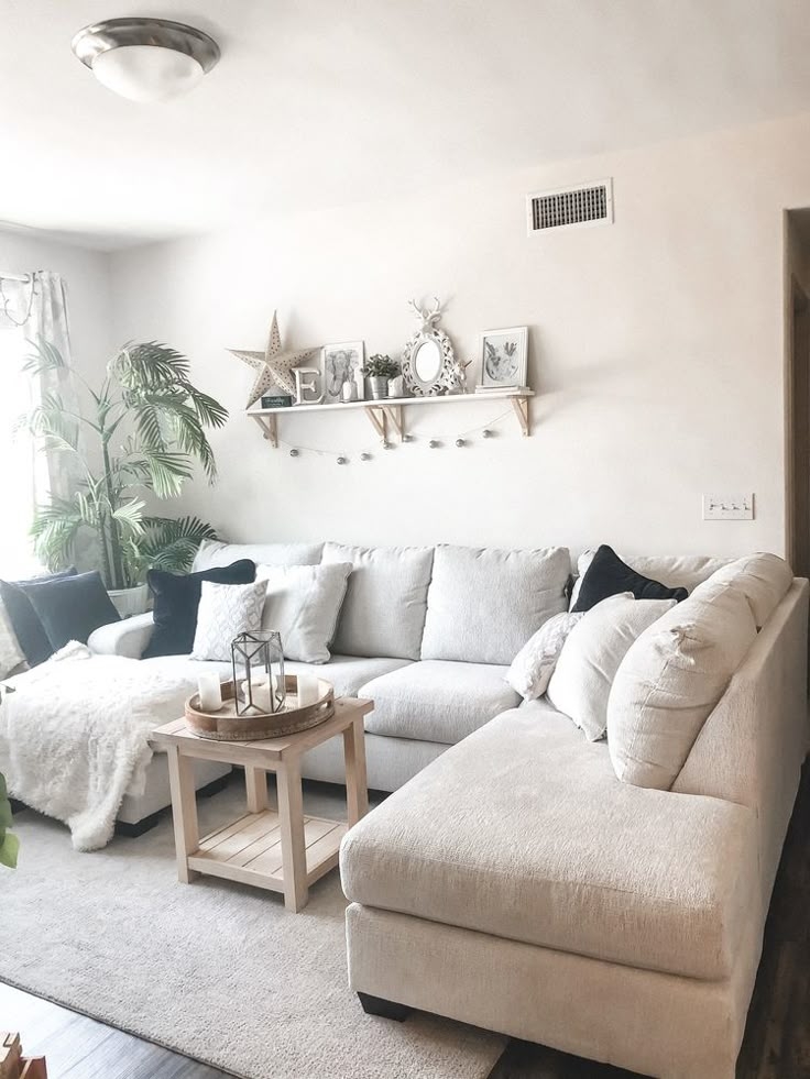 Sectional Sofa Off-White Monochromatic Layers and Wood Table