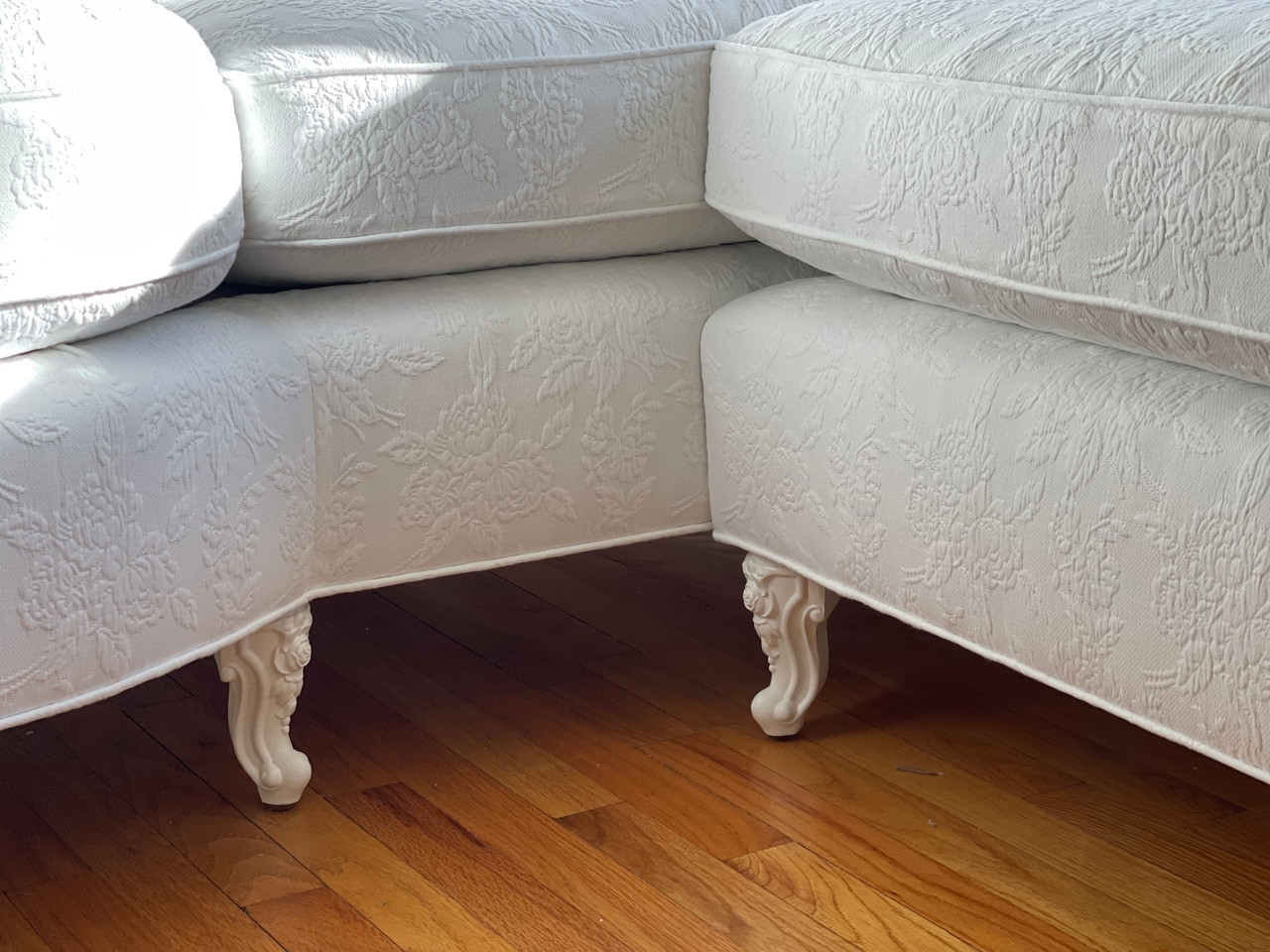 Sectional Sofa with Floral Embossed Fabric and Ornate Carved Legs
