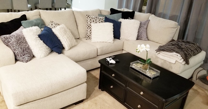 Sectional Sofa with Scatter Back Pillows and Cream Chaise