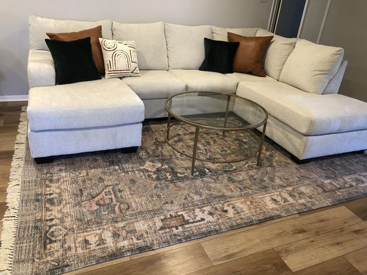Sectional Sofa with Vintage Style Rug and Brass Coffee Table