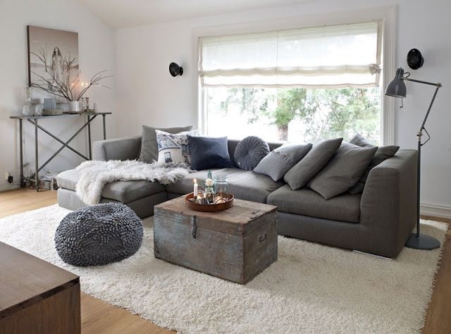 Sectional Sofa with Vintage Trunk Table and Cozy Scandi Decor