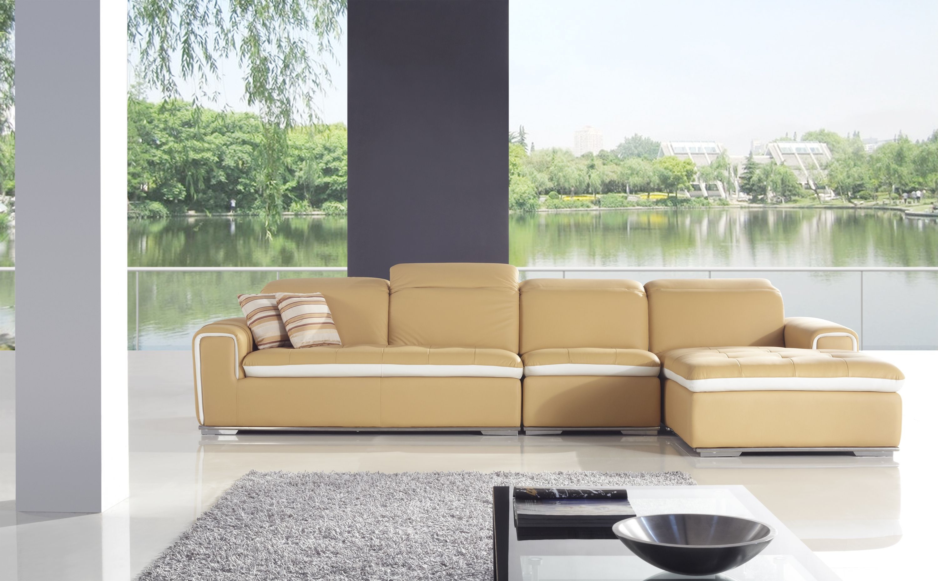 Sectional Sofa with White Piping and Tufted Chaise Section