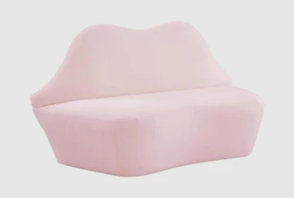 Settee with Lip Shaped Back and Whimsical Armless Design