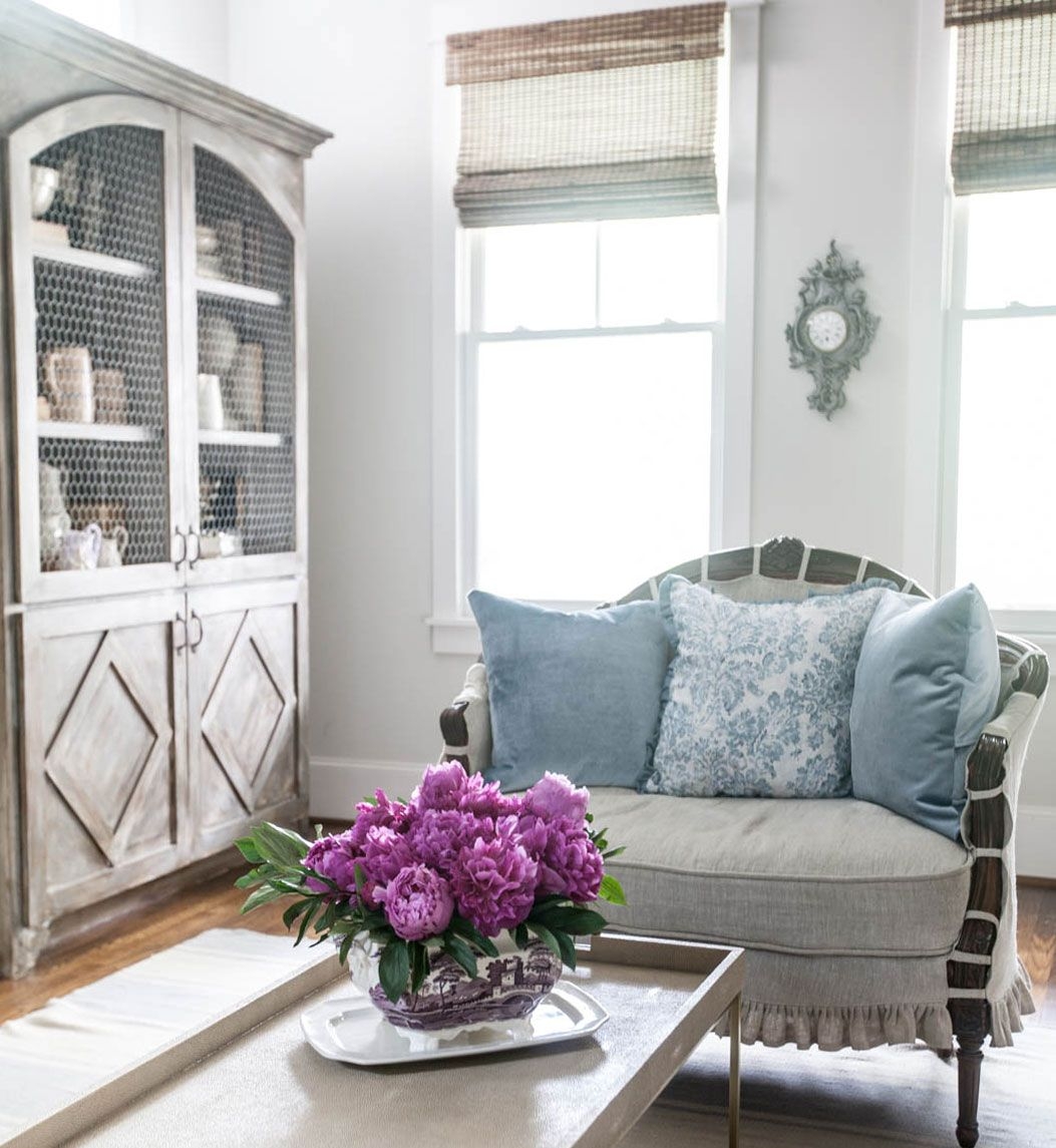 Settee with Ruffled Skirt and Chicken Wire Door Cabinet Styling