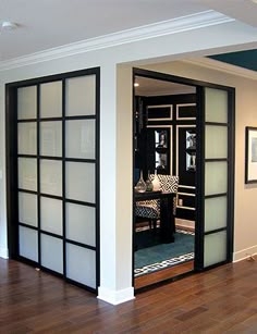 Sliding Room Divider: Corner Configuration Black Grid Office Wall