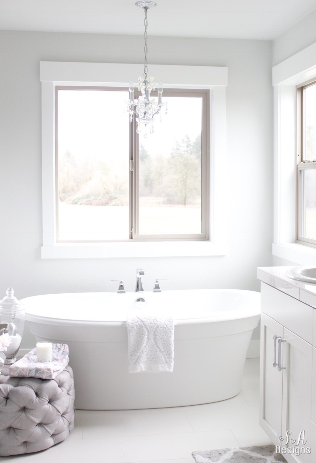 Soaking Tub with Crystal Pendant and White Freestanding Tub