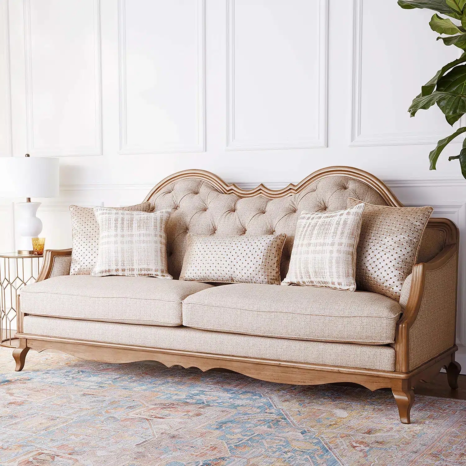 Sofa featuring Camelback Silhouette and Scalloped Wood Apron