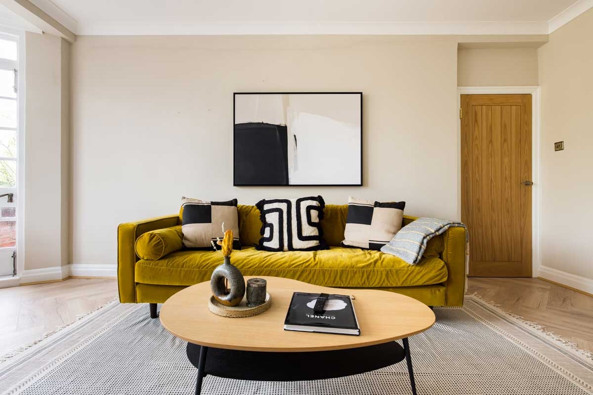 Sofa Mustard Velvet and Modern Organic Wood Coffee Table Styling