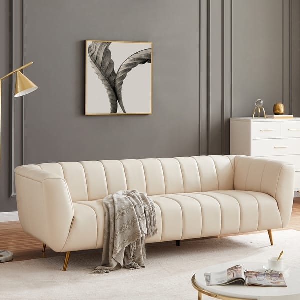 Sofa with Vertical Channel Tufting and Gold Tapered Legs