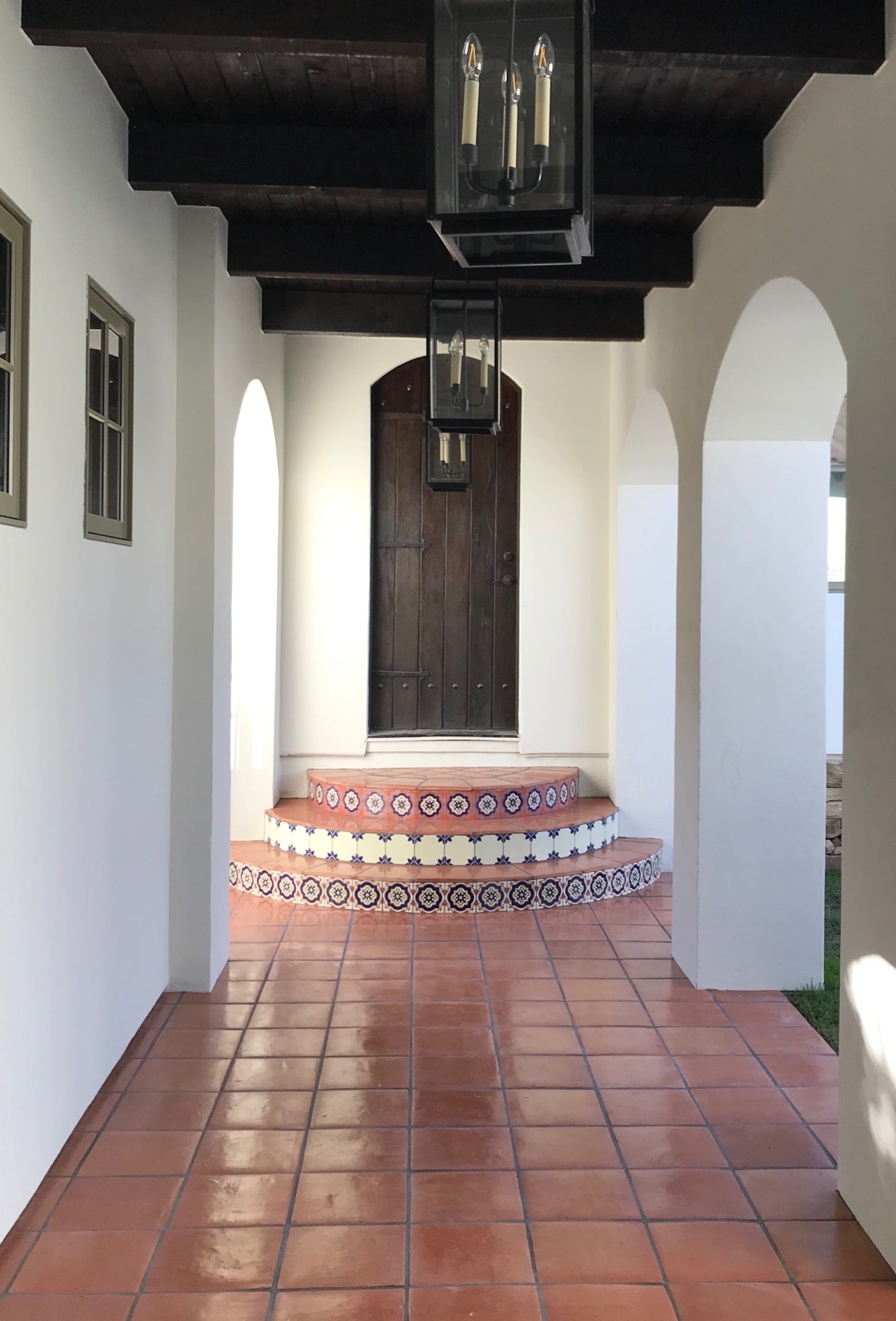 Tile Flooring using Saltillo Tiles and Decorative Risers