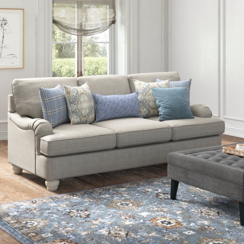 Upholstered Sofa with Pleated Rolled Arms and Whitewashed Bun Feet