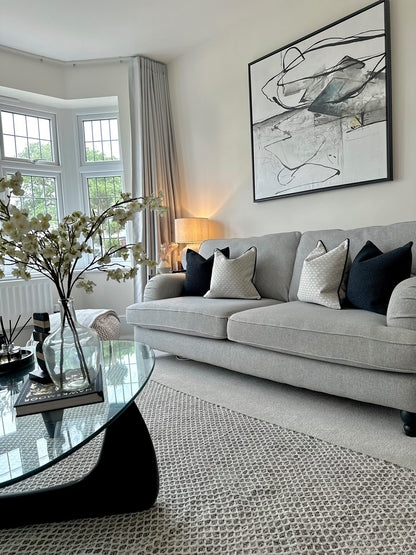 Upholstered Sofa with Textured Upholstery and Dark Turned Legs
