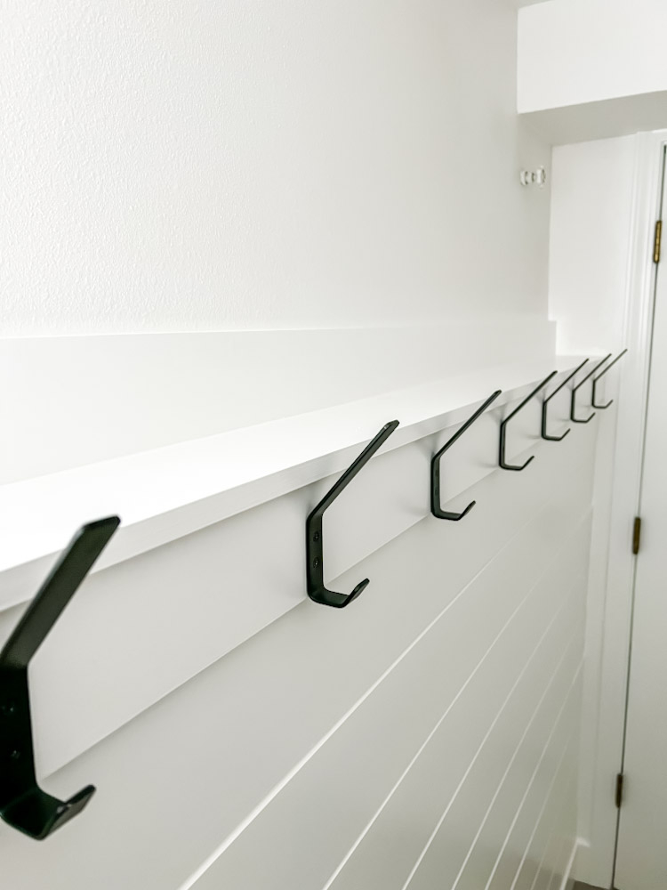 Wall Coat Rack with Angular Hooks and Integrated White Wall Ledge