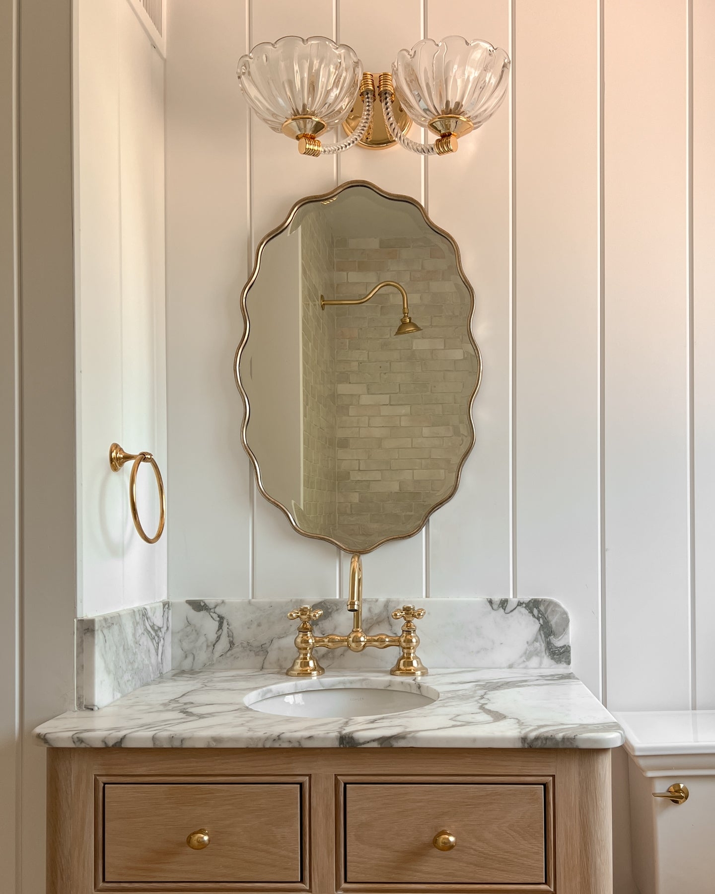 Wall Mirror: Polished Scalloped Edge Wavy Gold Vanity Mirror
