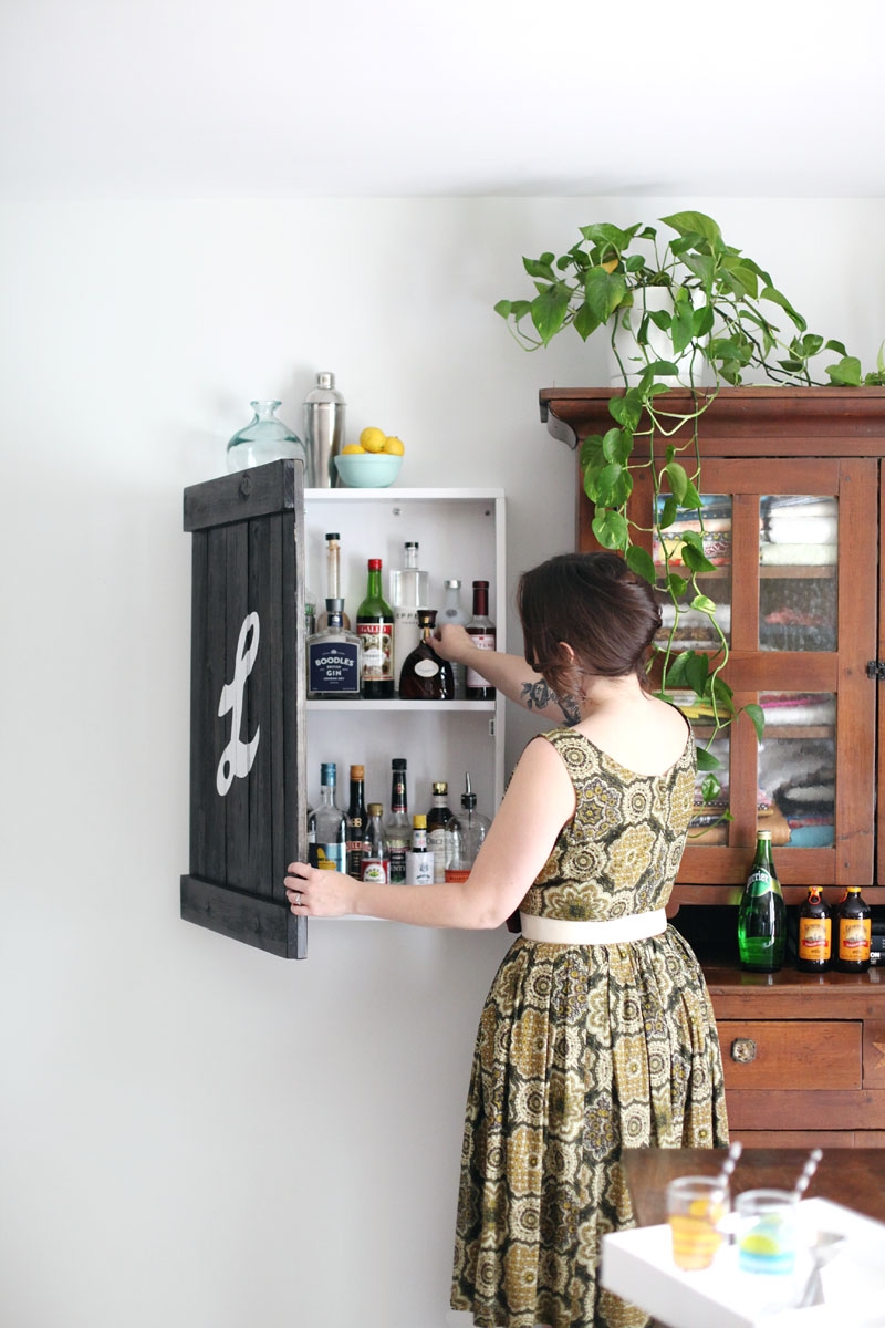 Wall Mounted Bar: Shutter Door and Vintage Sign Bar Storage