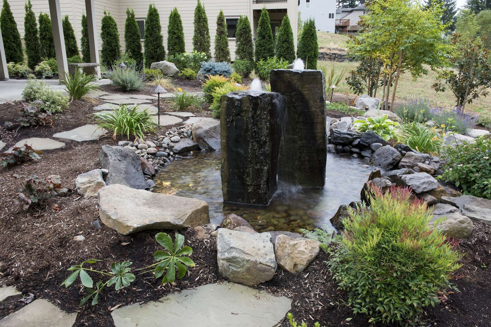 Water Fountain Basalt Like Pillars and Integrated Rock Pond