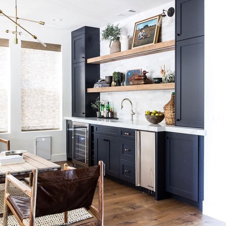 Wet Bar Cabinetry with Navy Cabinetry and Floating Wood Shelves