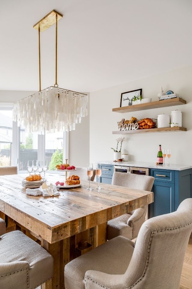 Wet Bar with Navy Cabinets and Shell Chandelier Lighting