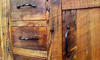 Wood Vanity Rustic Cabinetry with Twisted Hardware and Panel Fronts