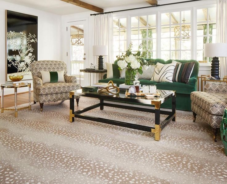 Area Rug with Black Gold Accents and Fawn Patterning