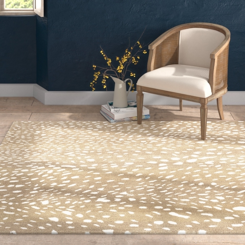 Area Rug with Cane Accent Chair and Hand Tufted Pile