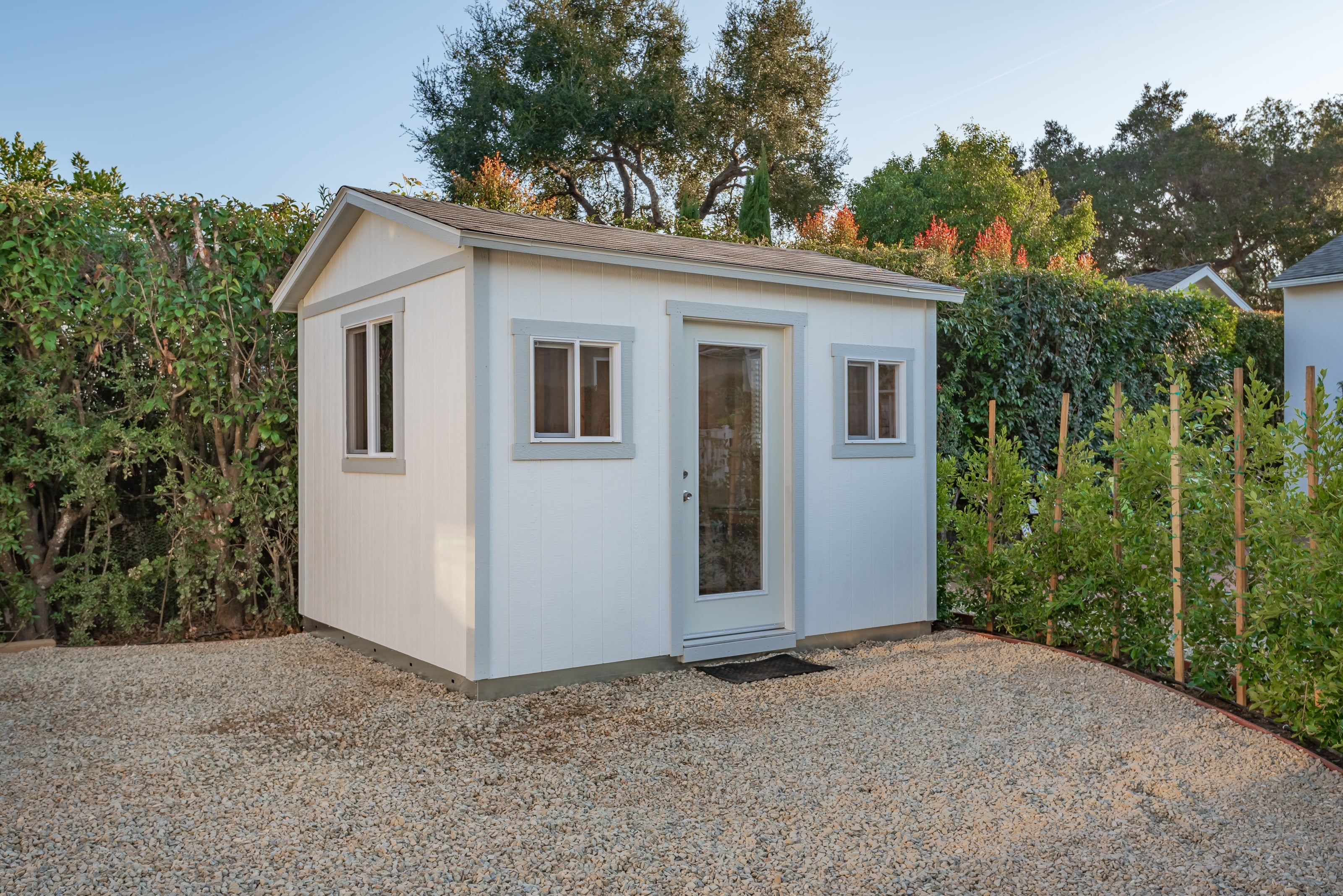 Backyard Studio with Full Glass Entry and Multi-Window Layout