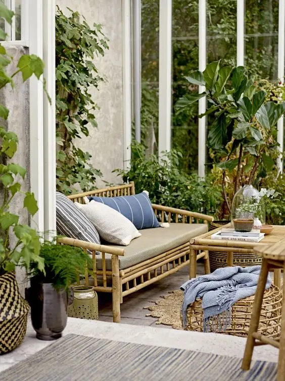 Bamboo Sofa Spindle Construction and Boho Sunroom Decor