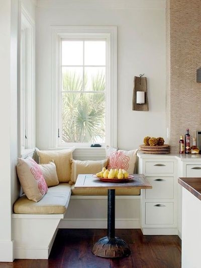 Banquette Seating: Industrial Pedestal and Coral Pillows