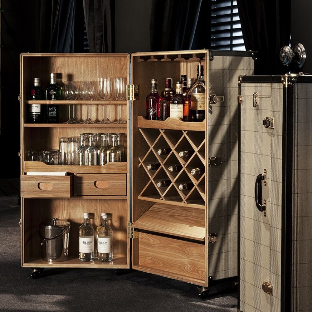 Bar Cabinet with Checkered Fabric and Rolling Trunk Design