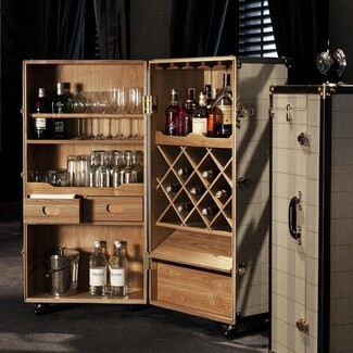 Bar Cabinet with Checkered Fabric and Rolling Trunk Design