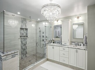 Bathroom Chandelier with Pebble Shower Floor in Master Bath