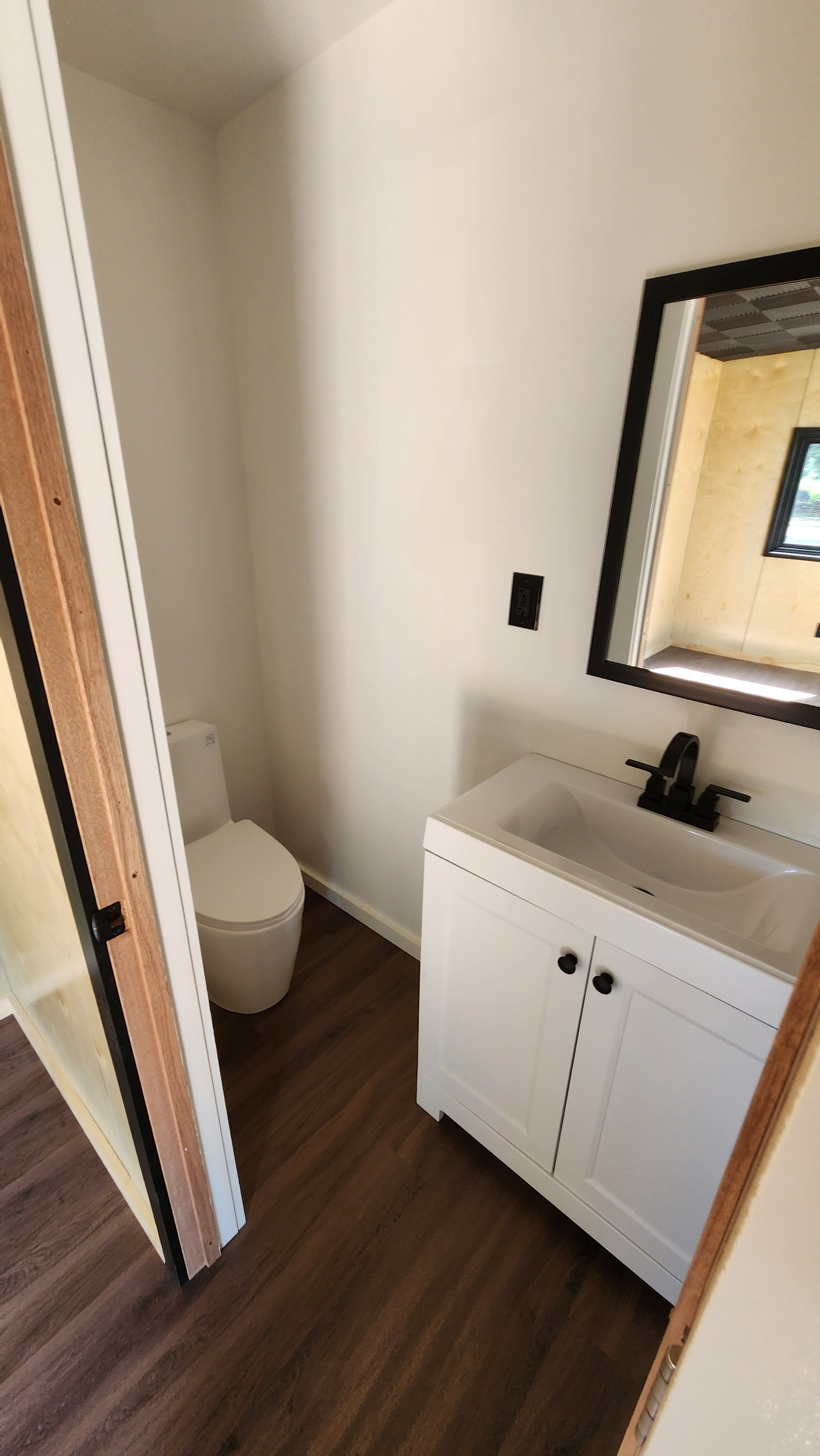 Bathroom Vanity with Matte Black Hardware and Shaker Cabinet