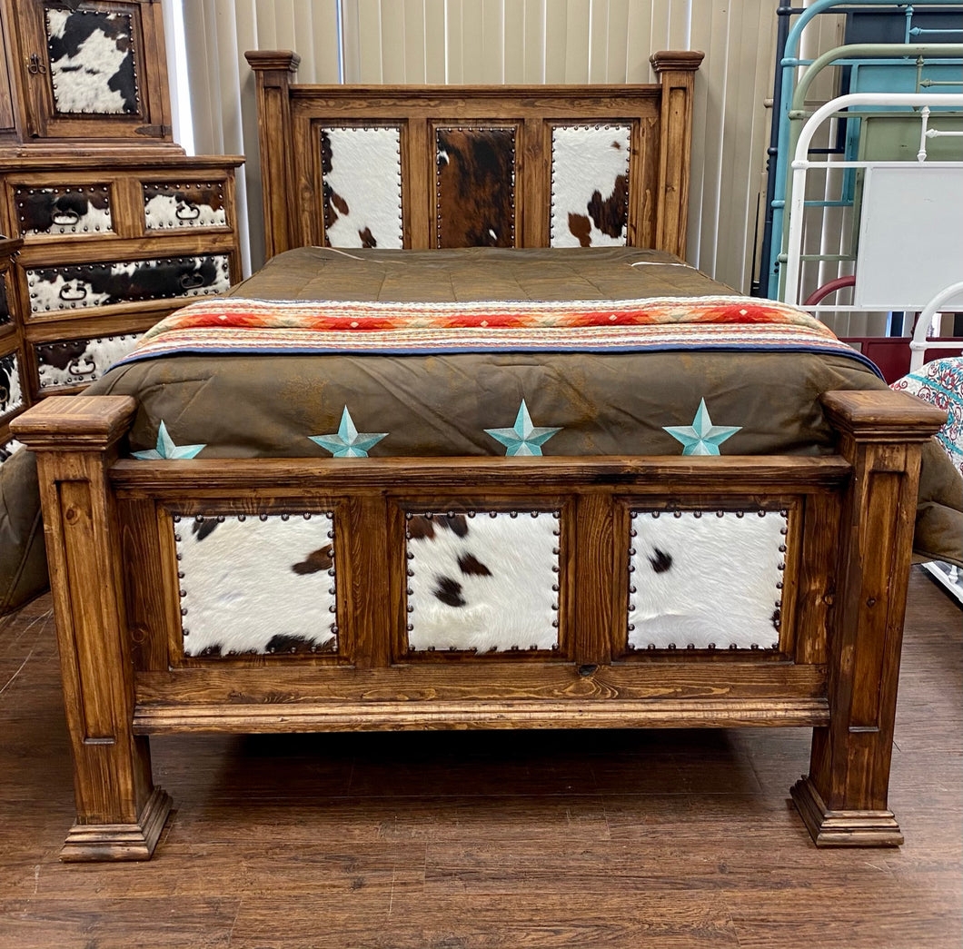 Bed Frame with Cowhide Inserts and Rustic Western Style