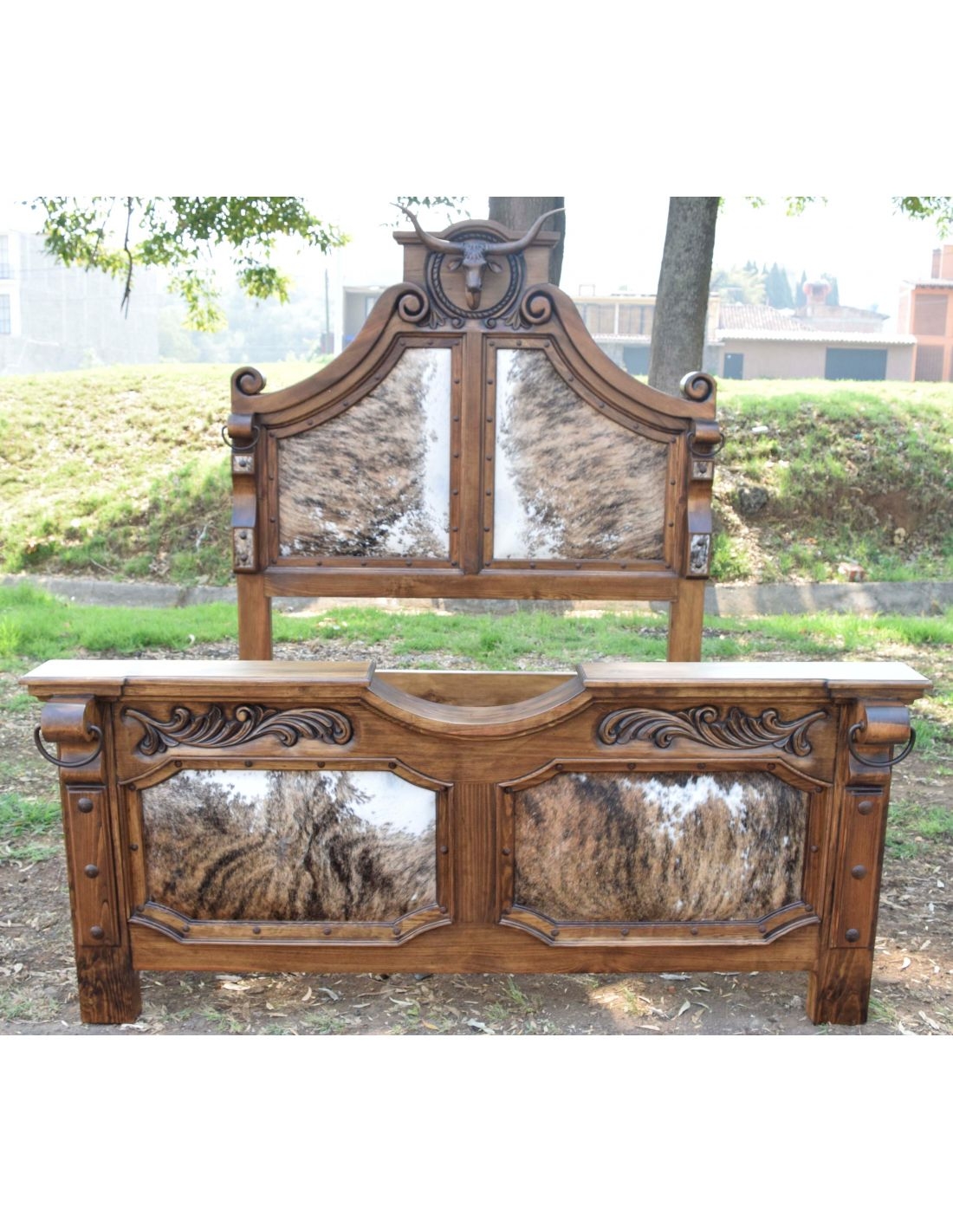 Bed Frame with Longhorn Sculpture and Hair on Hide