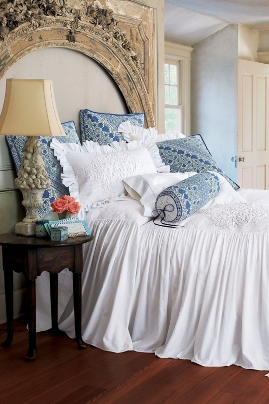 Bedroom Set with Ruffled Bedding and Arched Headboard