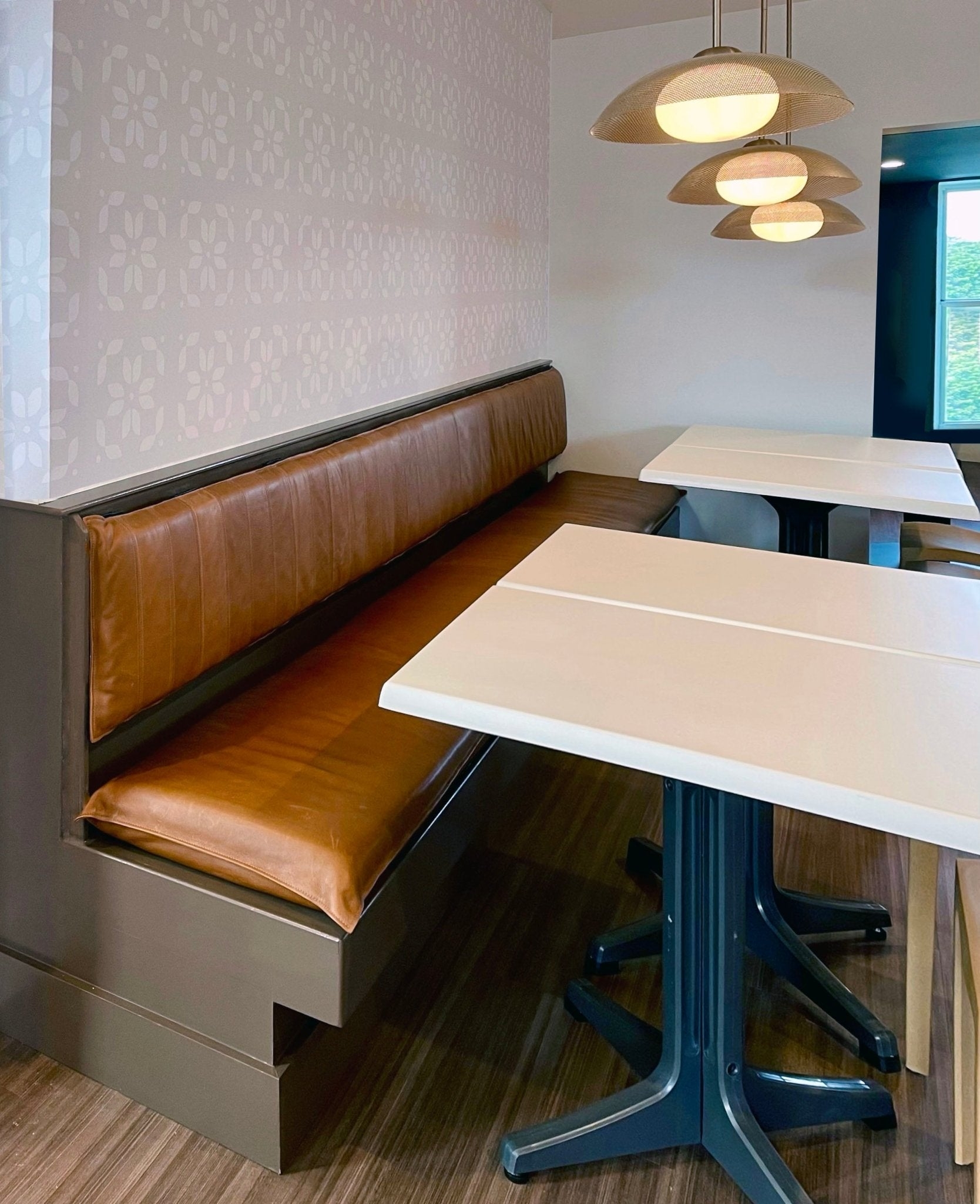 Built-In Banquette Booth with Mesh Dome Pendant Lights and Cognac Brown