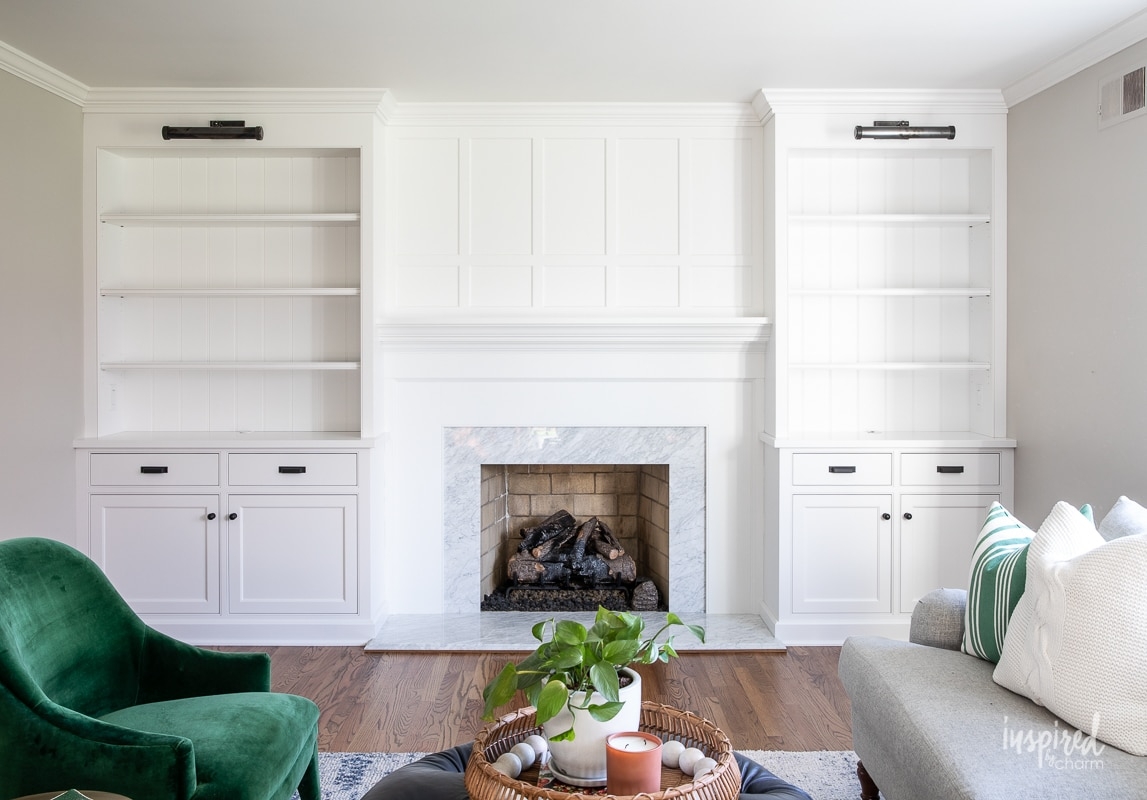 Built-In Bookcase with Board and Batten Accent and Picture Lights