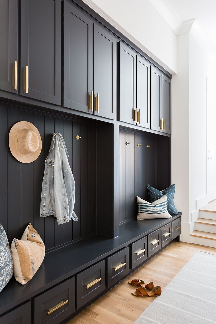 Built-In Mudroom: Matte Black Cabinetry with Brass Hardware