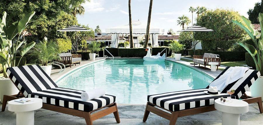 Chaise Lounge featuring Bold Striped Cushions and Wood Frames